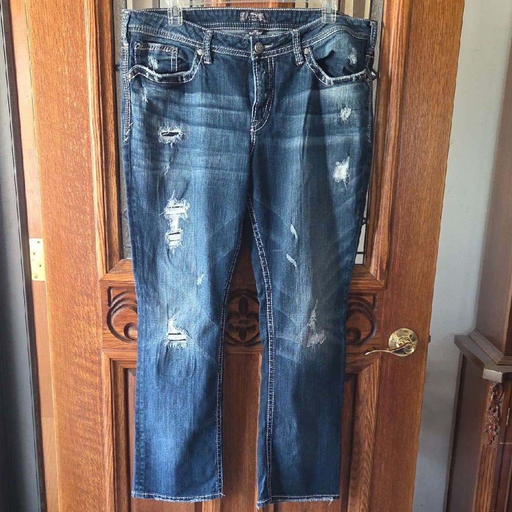 Silver Jeans Women's. AIKO Baby Boot Distressed Jeans - Dark Blue. Size 22/L33
